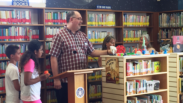 Bill Mallory, Branch Manager, announces new 3D printing program at the Clairemont Library