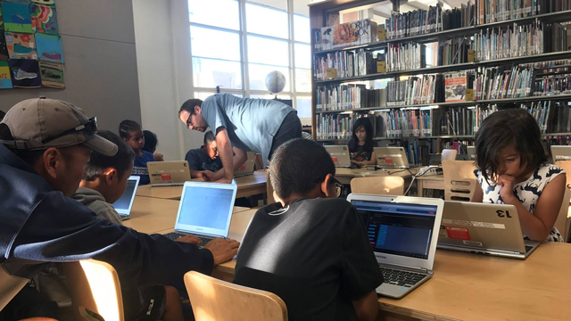 Children participating in a coding class at the North Park Library