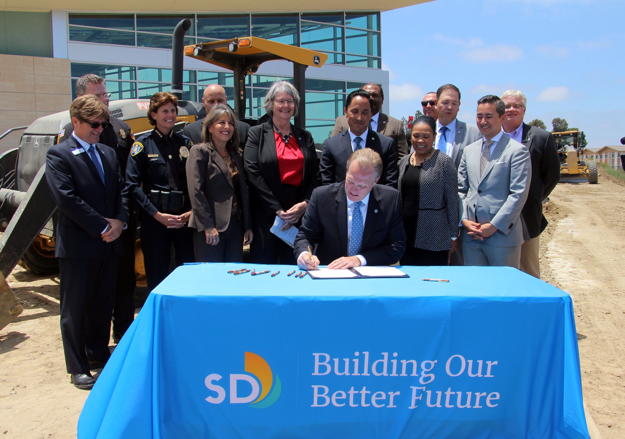 Mayor Kevin Faulconer signs the fiscal year 2017 budget.