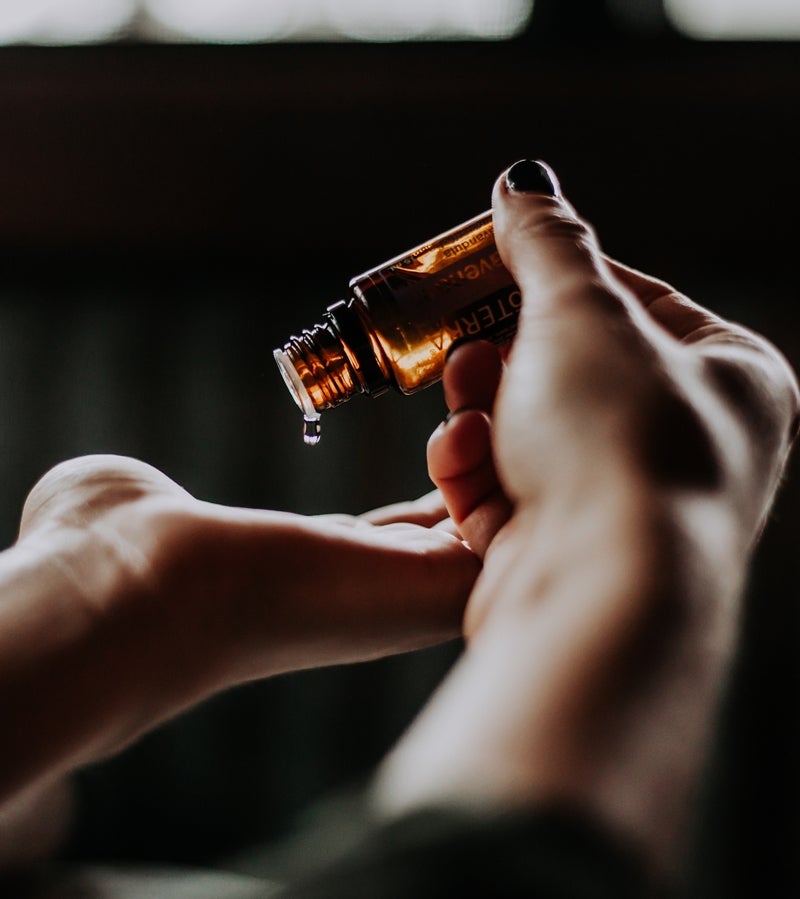 Photo of hands with essential oil