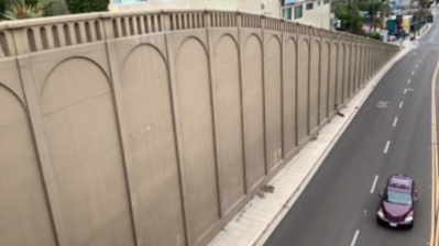 Ramp wall of Georgia Street Bridge after graffiti is removed