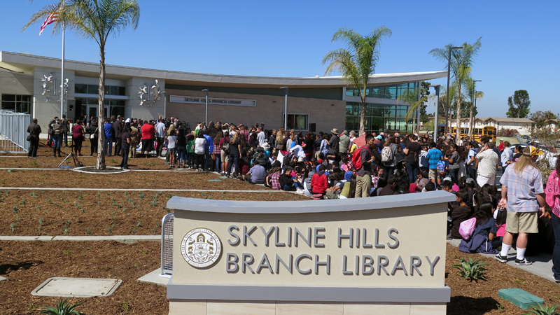 Large group of people outside the Skyline Hills Branch Library