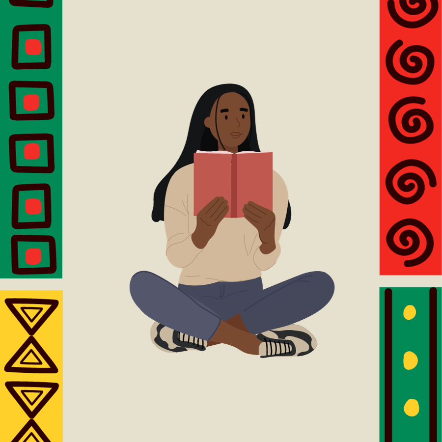 A young black girl sits cross legged on the floor. She reads a red book.