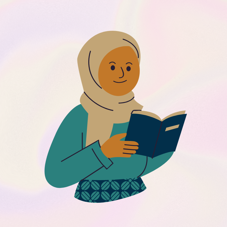 A young girl wearing a hijab reads a navy blue book.