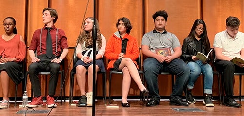 group of children participating in Poetry Out Loud