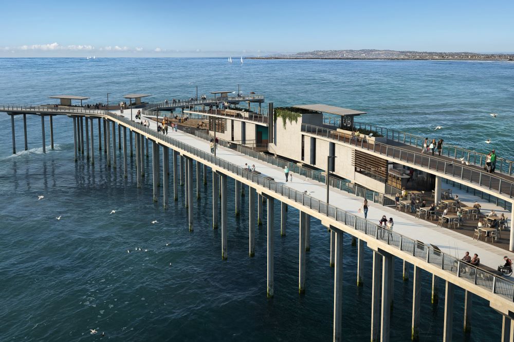 A rendering of the restaurant space located on Ocean Beach Pier. The pier has people walking on it is underneath a blue sky.