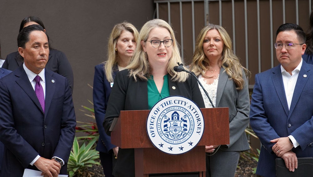City Attorney Heather Ferbert and City Leadership speak at the Housing Protection Unit launch press conference