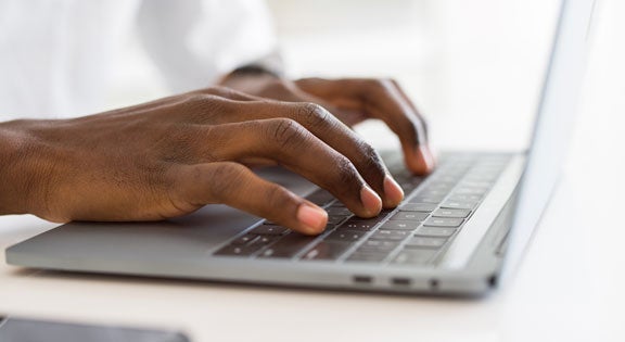 Hands on typing on a keyboard