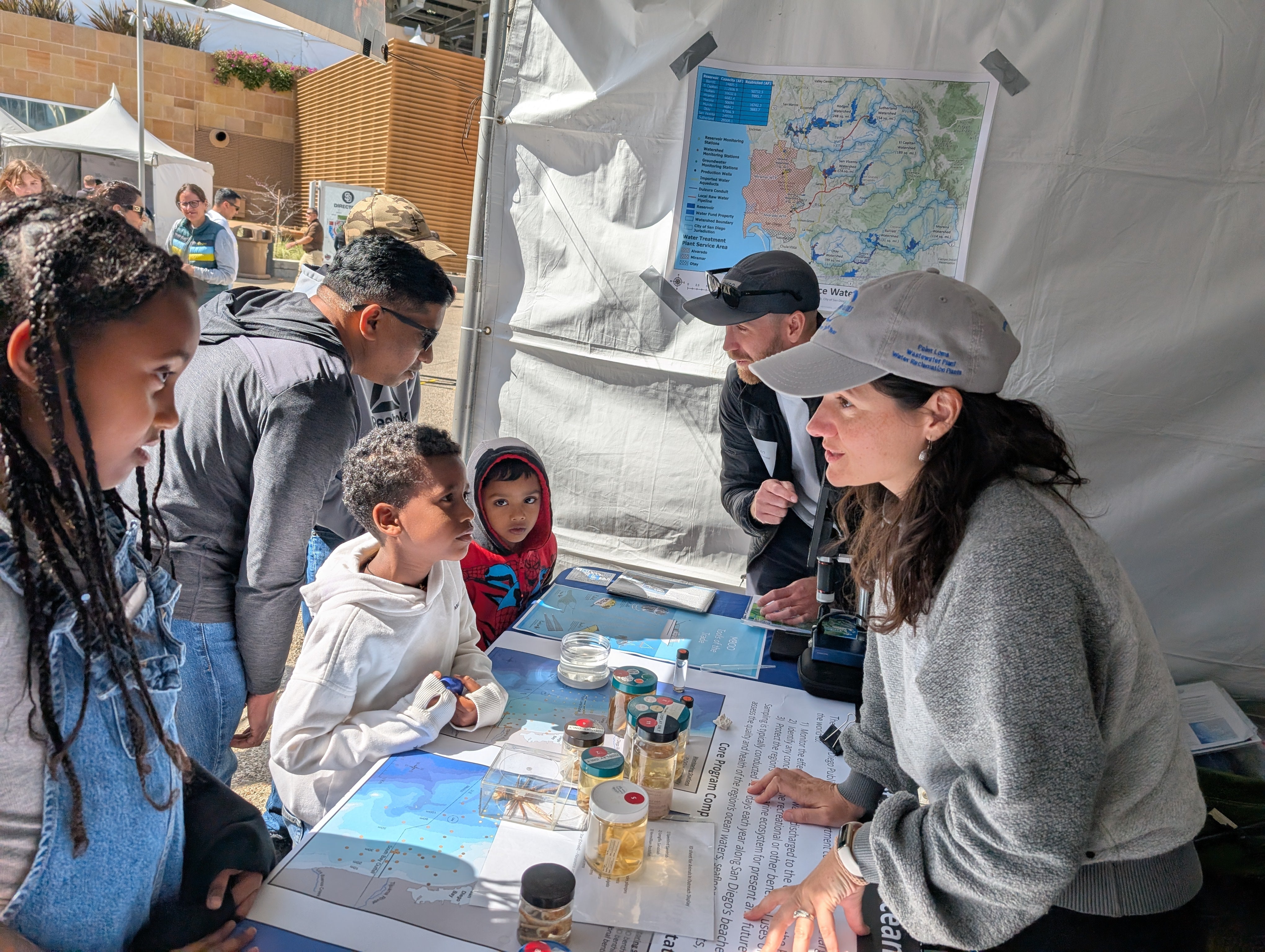 A marine biologist shows common invertebrates found as part of the City's Ocean Monitoring Program.