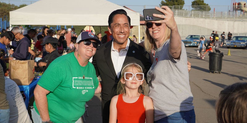 Mayor Todd Gloria posing for a selfie