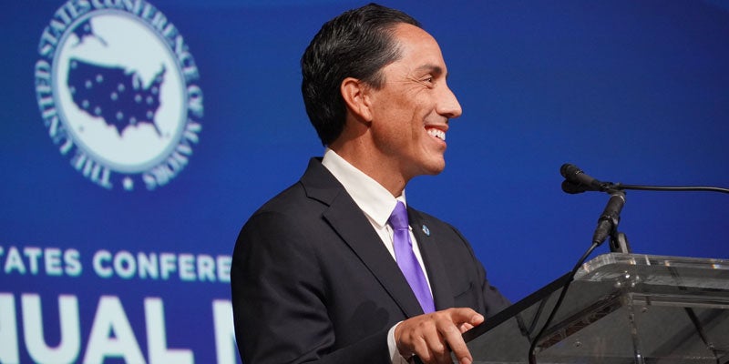 Mayor Todd Gloria giving a speech on stage 
