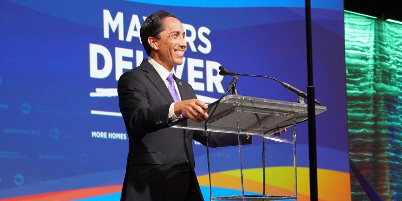 Mayor Todd Gloria giving a speech on stage