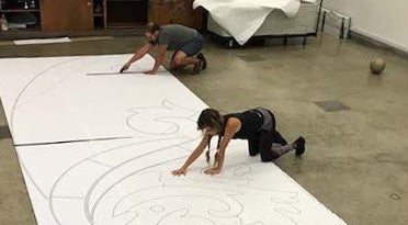Artists working on an art installation