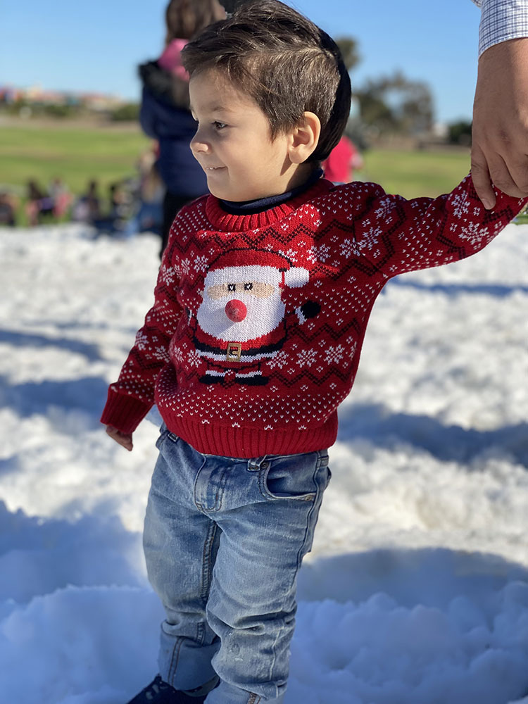 photo of little boy in the snow