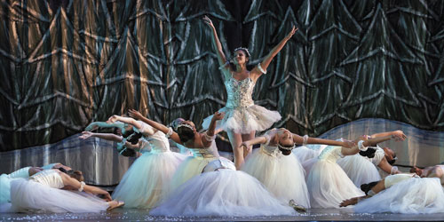 A December Nights show featuring ballerinas on a stage