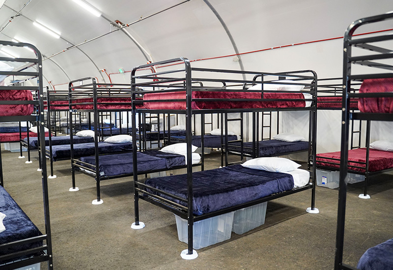 Beds inside the bridge shelter