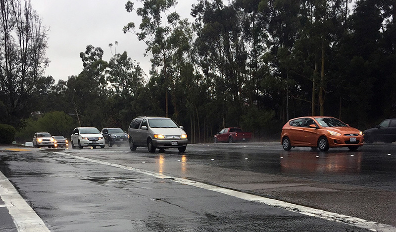 Cars on a wet road on a rainy day