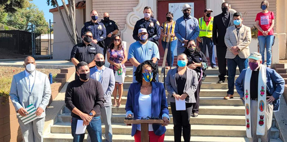 photo of Monica Montgomery and others wearing masks