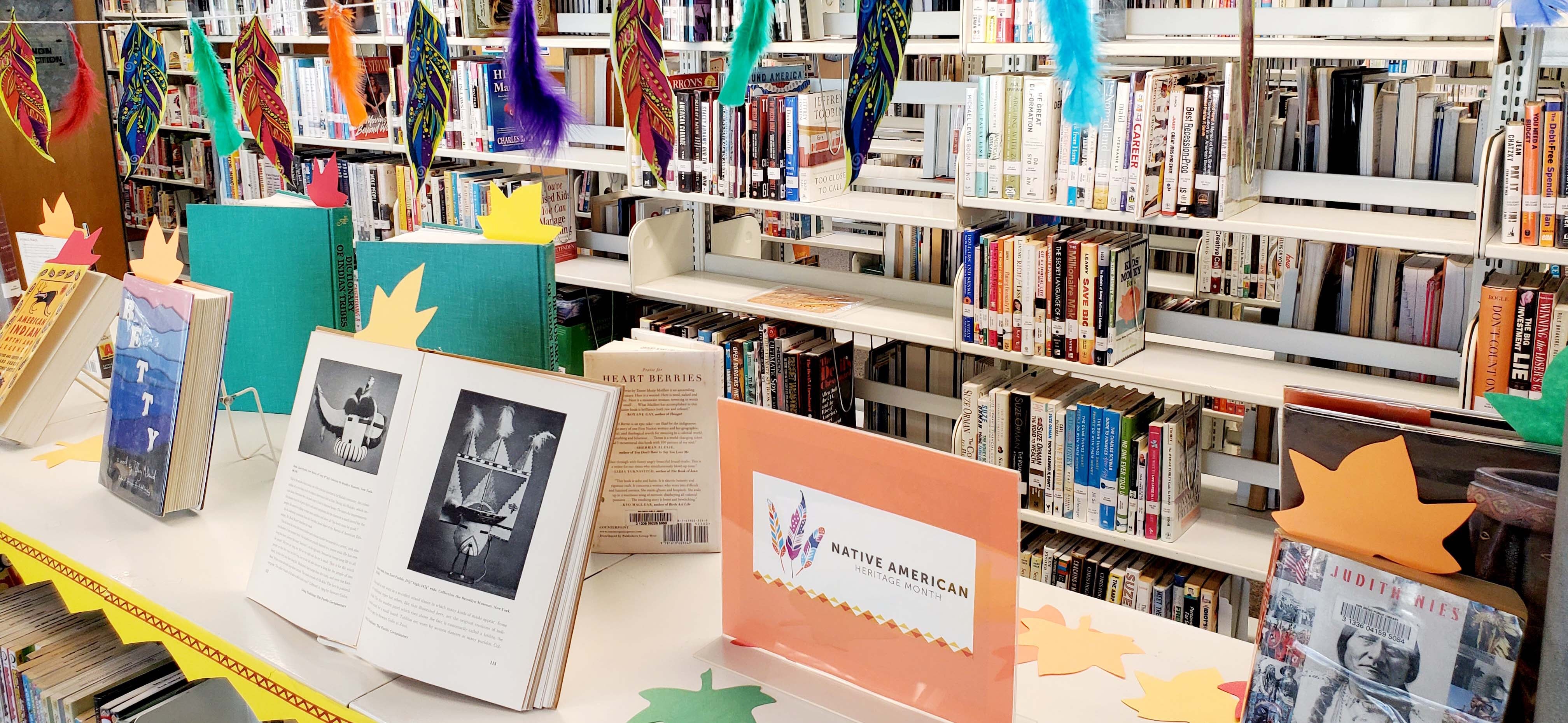 Book display for Native American Heritage Month at CM