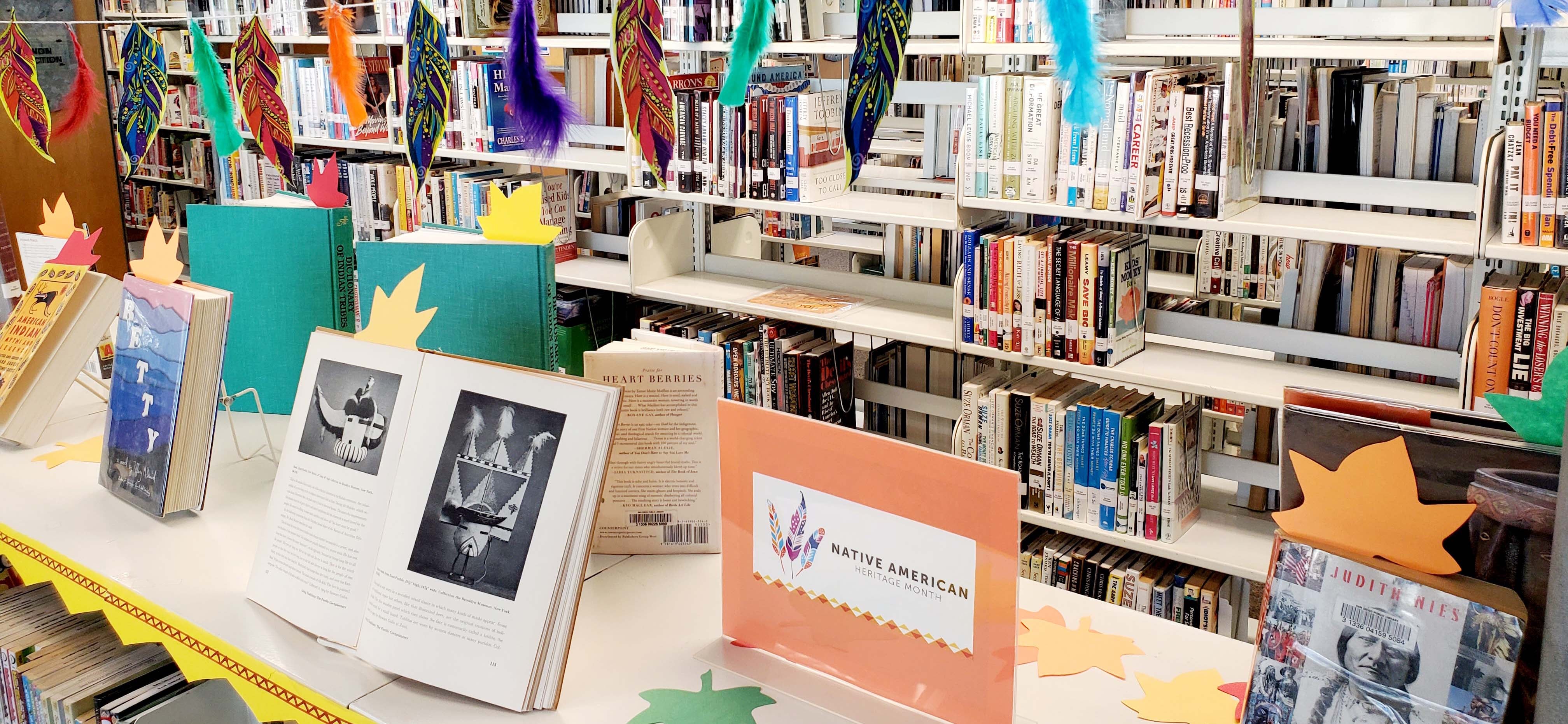 Book display for Native American Heritage Month at CM