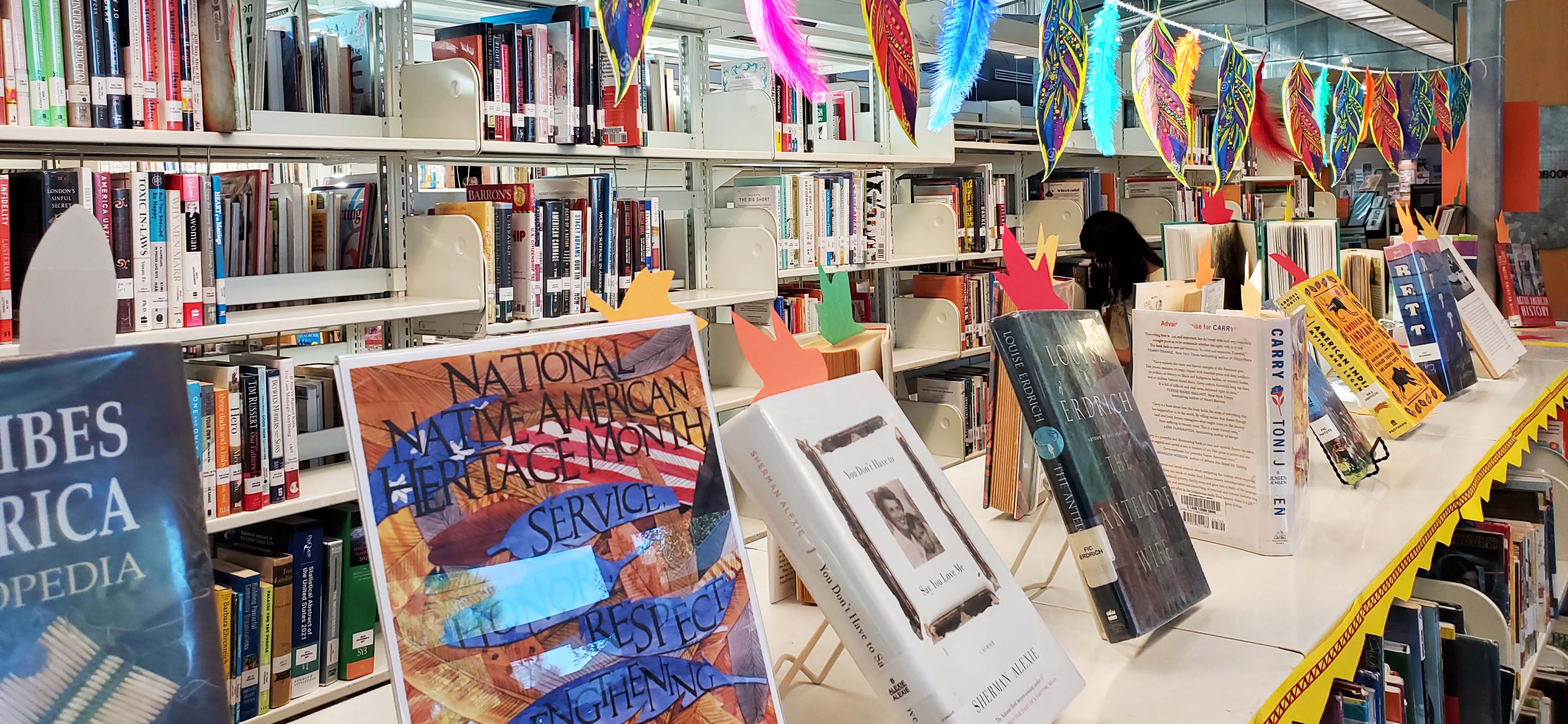 Book display for Native American Heritage Month at CM