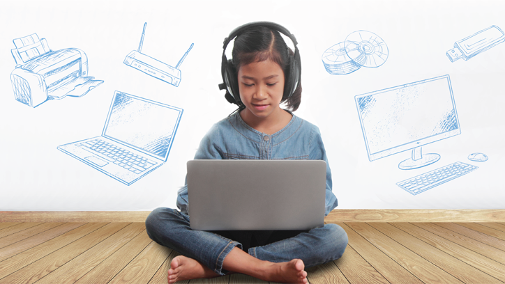Image of girl sitting in front of laptop