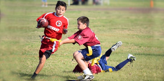 Photo of Boys Playing Flag Football