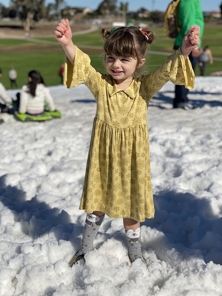 photo of little girl in the snow