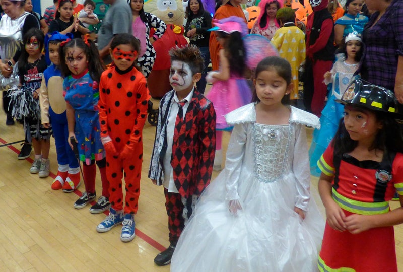 photo of kids in halloween costume