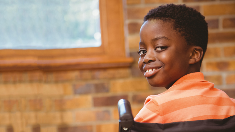 Image of kid in a wheelchair
