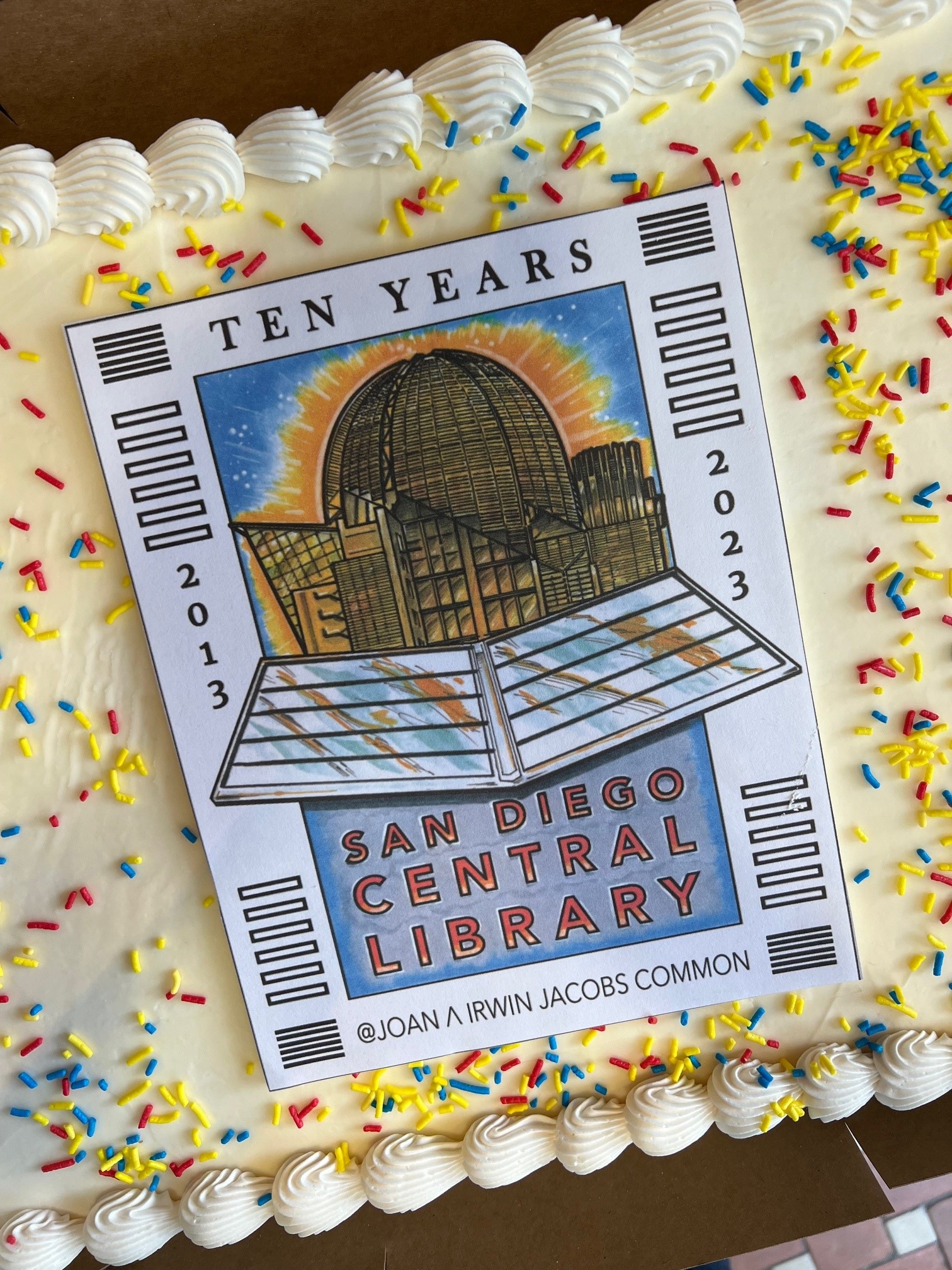 Cake decorated with Central Library 10 year anniversary logo