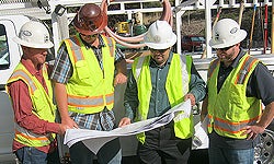 Photo four Construction Workers with Hard Hats Photo from Skyline Drive Corridor Improvements Project Ribbon-Cutting Ceremony