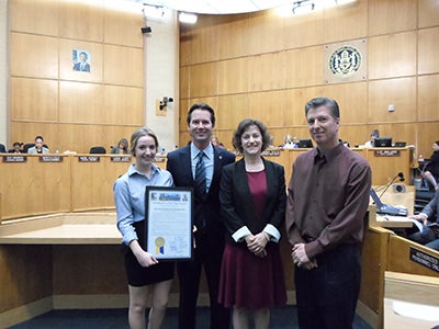 Photo 1 of 1: Councilmember Kersey Presenting District Five resident Savannah Reed-Plouffe with a proclamation for her work in the Rancho Bernardo senior community