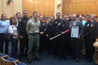 Photo of Councilman Sherman with Officer Lockwood