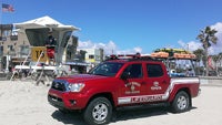 Photo of Lifeguard Toyota Truck on the Beach