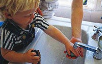 Photo of Child Washing Hands