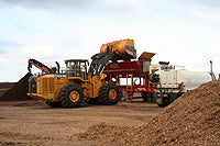 Photo of machinery grinding wood