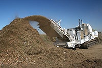 Photo of machinery grinding wood