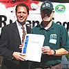 Photo of Councilmember Maienschein Presenting Award to Team