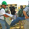 Photo of Team Members Carrying a Victim