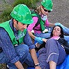 Photo of Volunteers Placing Splint on Patient