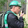 Photo of Team Member Using a Walkie Talkie