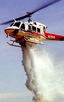 Photo of helicopter dropping water