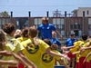 Children exercising following the instructor