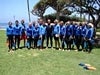 Group of people standing in blue swim suit