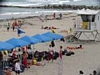 Picture of the beach with tents and people