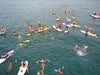 Kids boating and swimming