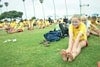 Kids performing stretching exercises in the field