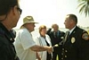 A firefighter shaking hands with a citizen