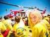 Group of kids watching a helicopter